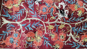 Suzani hand-embroidered silk fabric - red