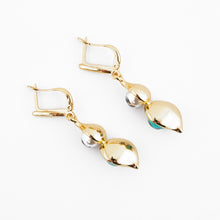 Afbeelding in Gallery-weergave laden, Gold earrings with traditional Ikat pattern